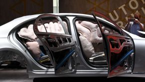 An airbag functionality safety test done on a Mercedes-Benz vehicle frame