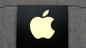 The Apple Logo on a lit sign outside of an Apple Store. Is it possible that the Apple Car is revealed in 2021?