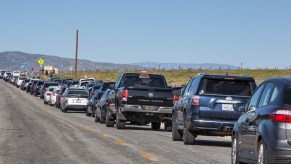 Cars sit in a line of traffic at the Antelope Valley Poppy Preserve one hour north of Los Angeles in March 2019