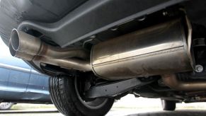 The exhaust pipe systems of a diesel car from Cologne, Germany