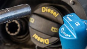 A closeup shot of a DEF diesel tank area of a vehicle