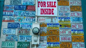 A wall of old license plates on a gift shop in Fairbanks, Alaska