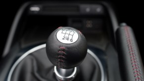 a leather-wrapped shift knob on a miata