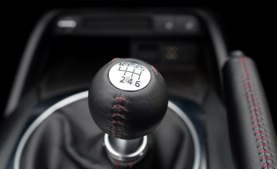 a leather-wrapped shift knob on a miata