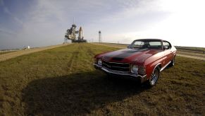 A red-and-black 1971 Chevy Chevelle SS 454 parked at Cape Canaveral