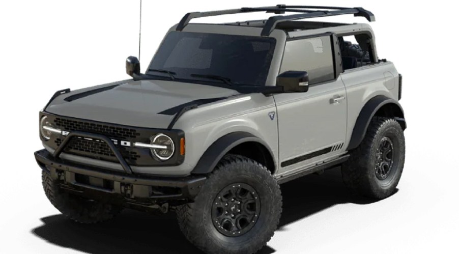 A taupe 2021 Ford Bronco First Edition against a white background.