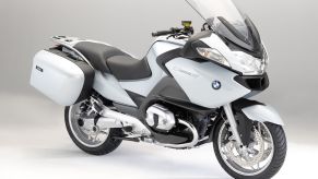 A white-and-black 2010 BMW R 1200 RT sport-touring bike