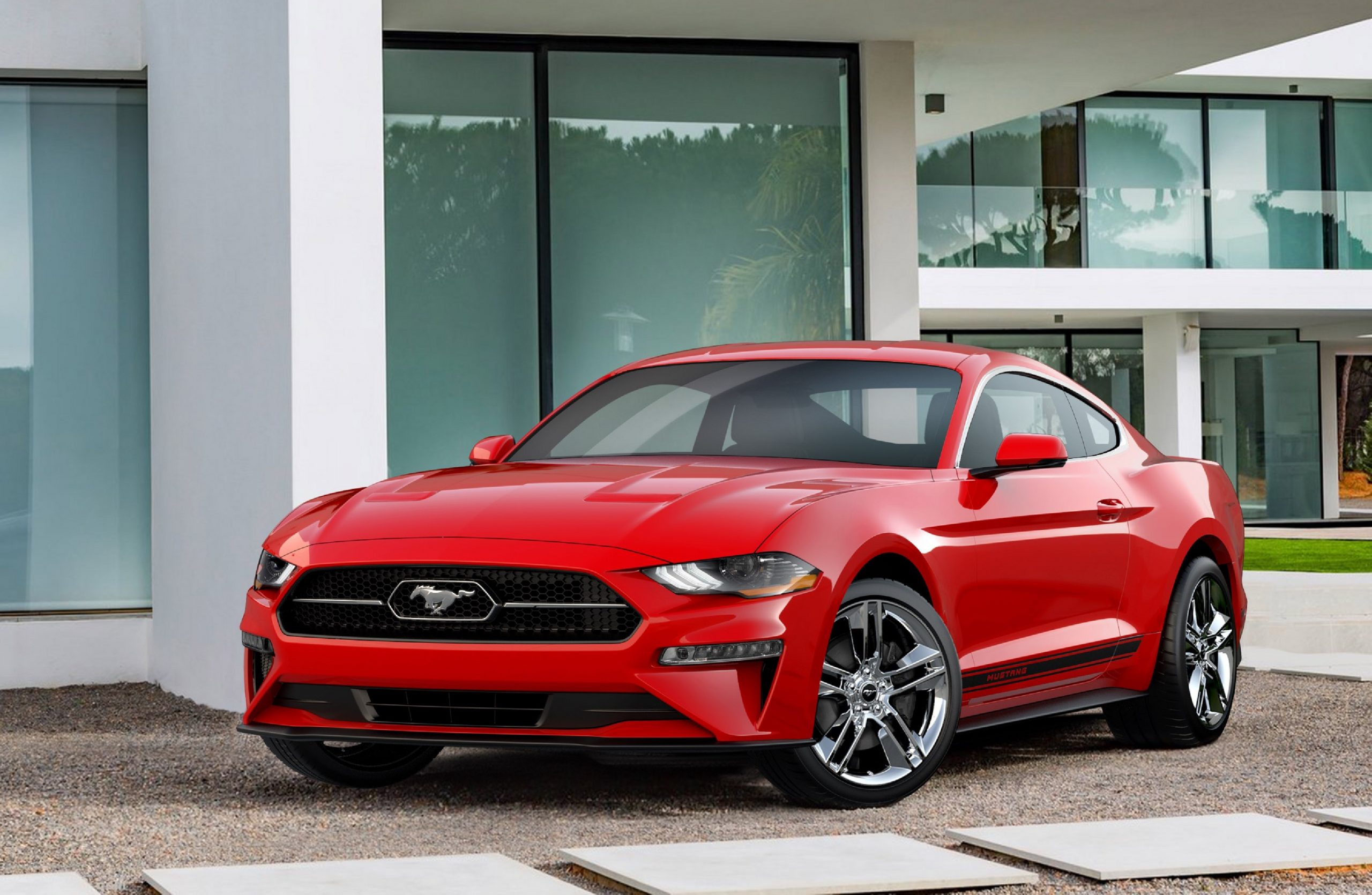 A red 2018 Ford Mustang shot from the front 3/4