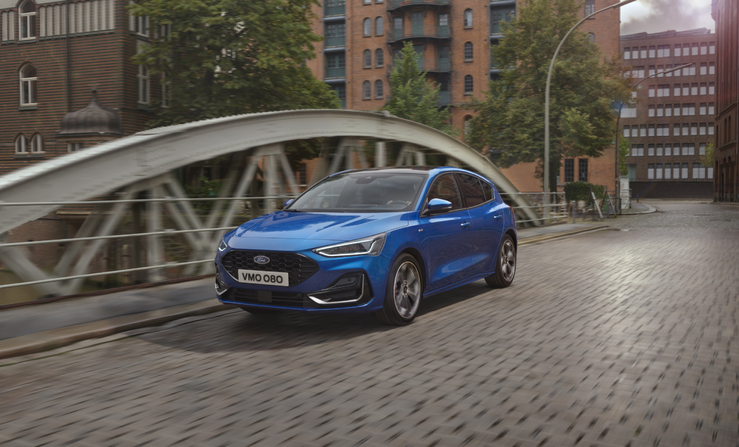 A blue 2022 Ford Focus on a ridgeb