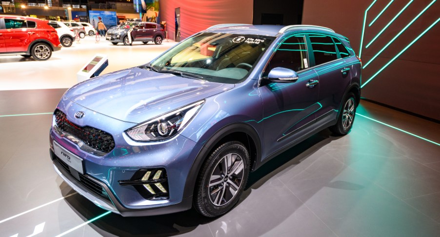 A blue 2022 Kia Niro SUV is on display.