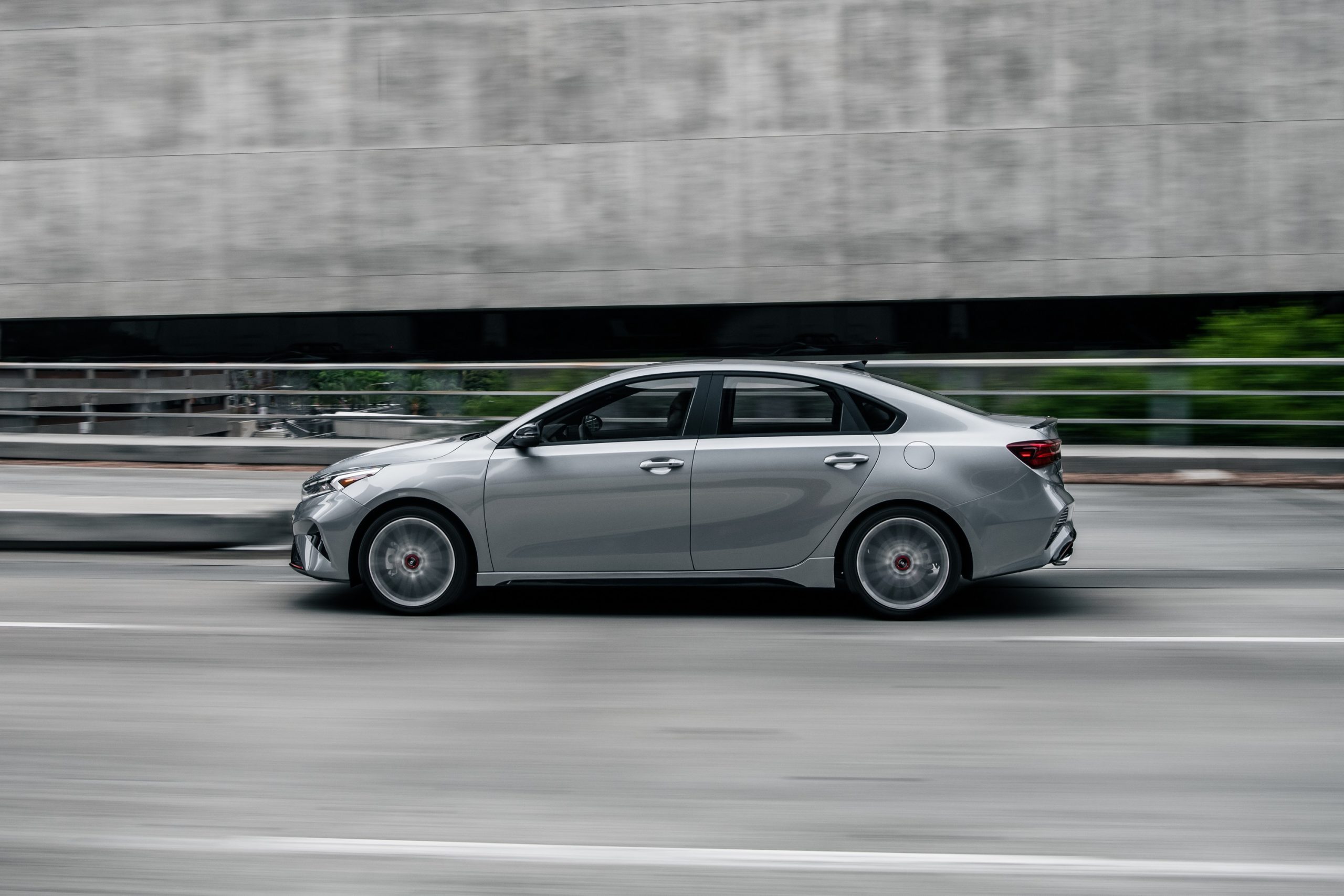 A silver 2022 Kia Forte shot in profile