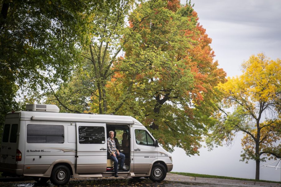 Class B Camper Van Parked In Woods. What's the average cost of a camper van like this one. BUt there are still some hidden RV costs that need to planned for.