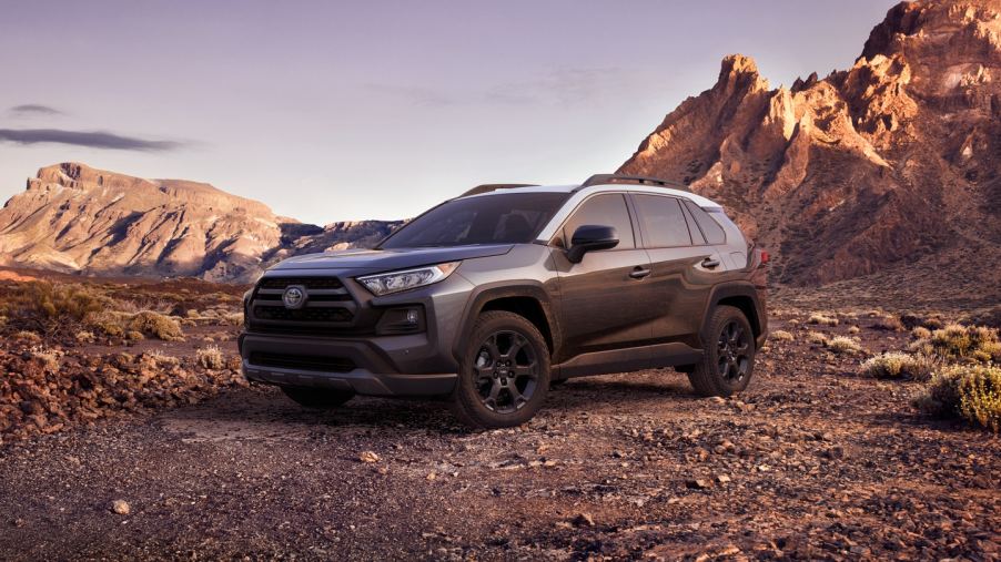 Dark gray 2022 Toyota RAV4 parked on desert terrain