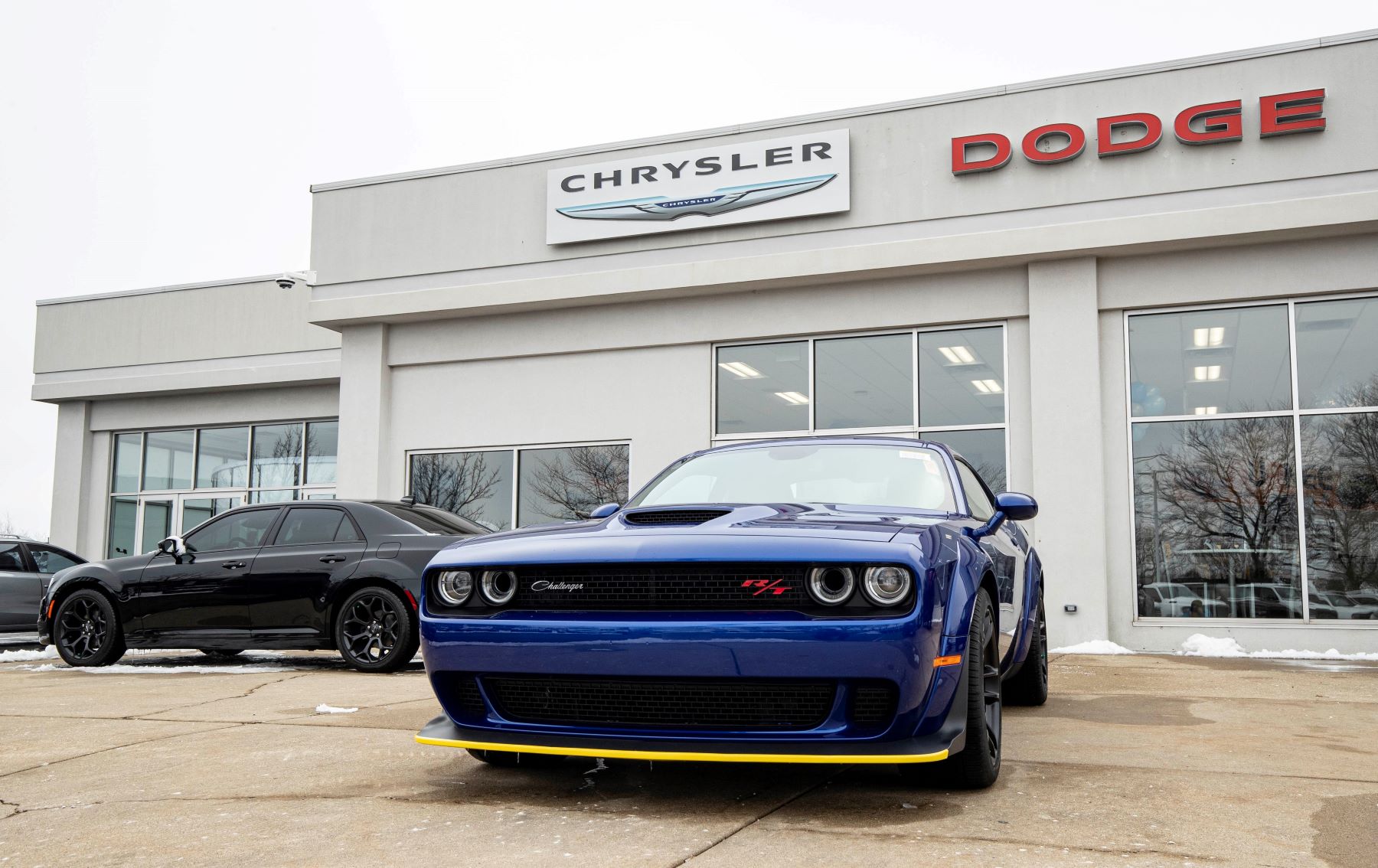 A Dodge Challenger outside of a Chrysler Dodge Jeep Ram FCA dealership in Gurnee, Illinois