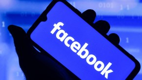 the Facebook logo seen displayed on a smartphone screen.