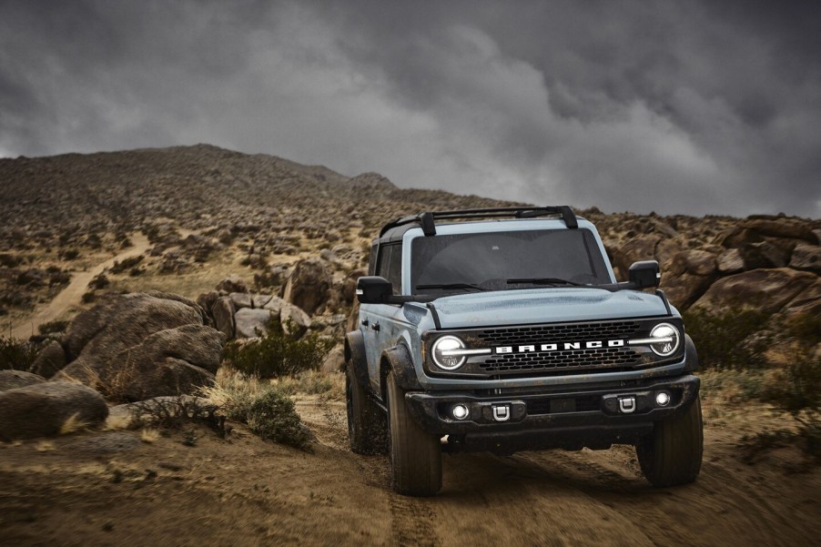 A sky blue 2021 Ford Branco in a desert rocky area.