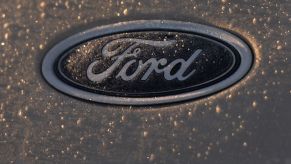 The Ford logo on a parked car in Dublin, Ireland