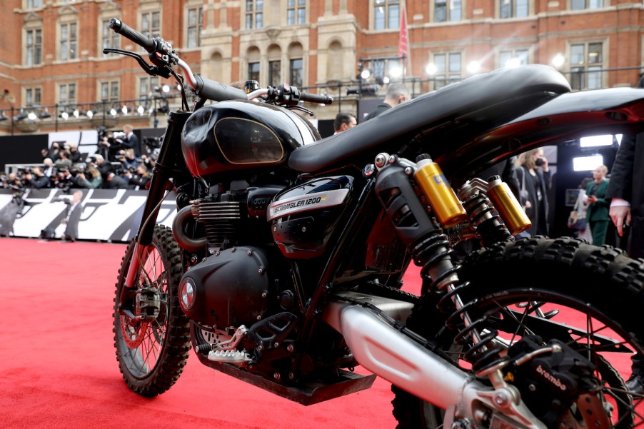 James Bonds Triumph Motorcycle at the World Premiere of "NO TIME TO DIE" The No Time To Die motorcycle completed an incredible two story jump in Matera Italy, using coca-cola | Tristan Fewings/Getty Images for EON Productions, Metro-Goldwyn-Mayer Studios, and Universal Pictures