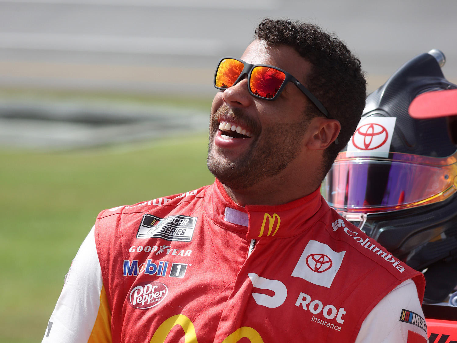 Bubba Wallace, driver of the #23 McDonald's Toyota, stands on the grid prior to the NASCAR Cup Series YellaWood 500 at Talladega Superspeedway on October 04, 2021 in Talladega, Alabama. Here's What Drivers Are Saying About NASCAR's Next Gen Cars. | Chris Graythen/Getty Images