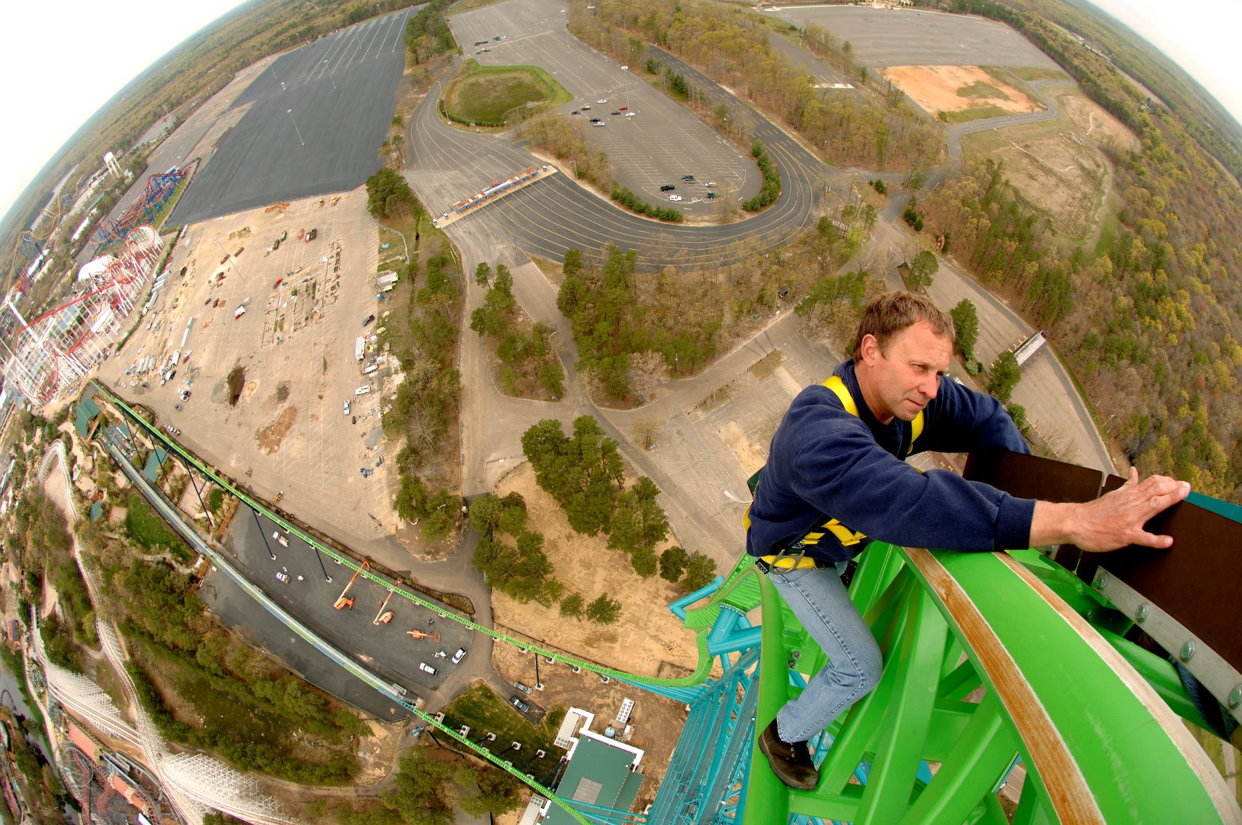 A workman performing maintenance on the Kingda Ka roller coaster