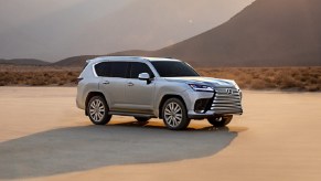 A silver 2022 Lexus LX 600 sitting in a desert.