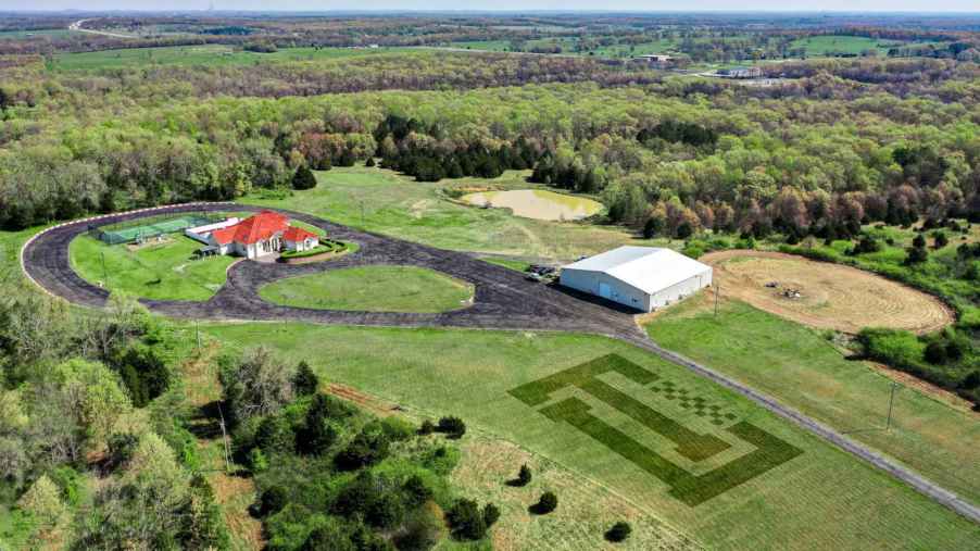 an areal veiw of the property with the race tracks visable