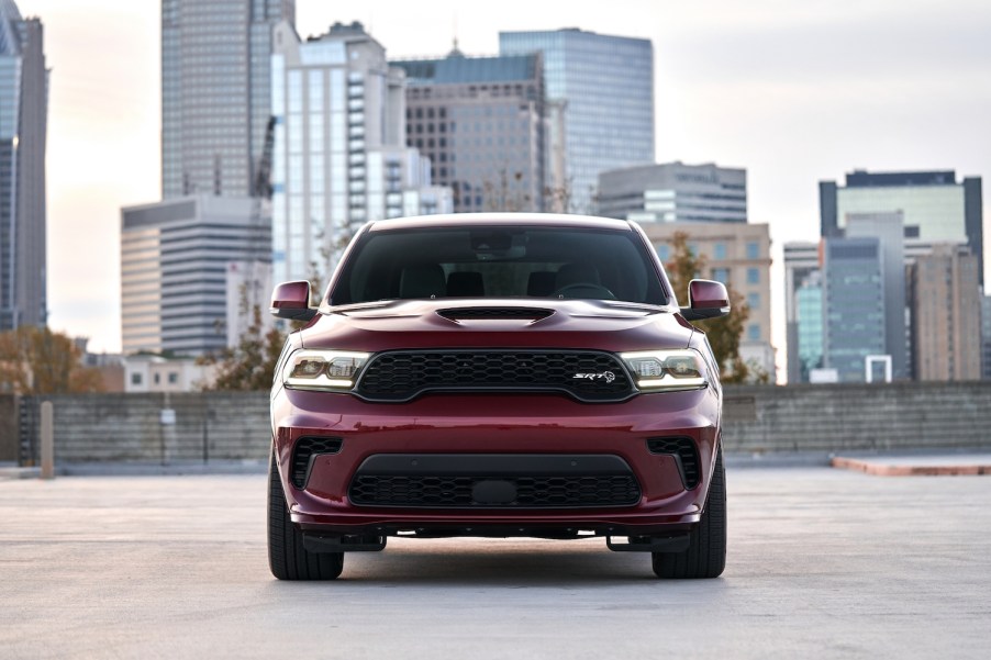 This is a promotional photo of the 2021 Dodge Durango SRT Hellcat in octane red. Dodged may have Killed The Durango Too Soon, the most recent SUV won Multiple Best Midsize SUV 2021 List Awards | Stellantis