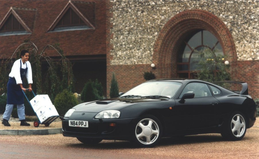 This guy on TikTok used his own body to cover his Toyota Supra like the one pictured