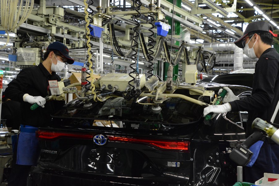 Autoworkers assembling a Toyota Prius at Toyota's Takaoka plant in Japan. Toyota is looking to regain production it lost during the global chip shortage