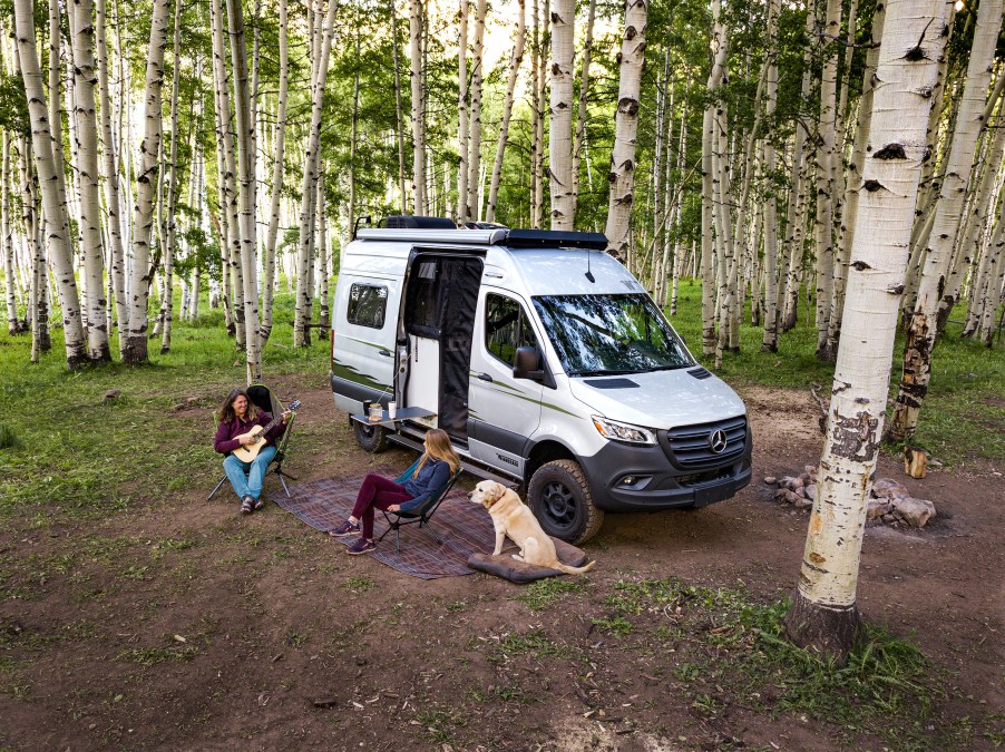 Winnebago camper van set up outdoors