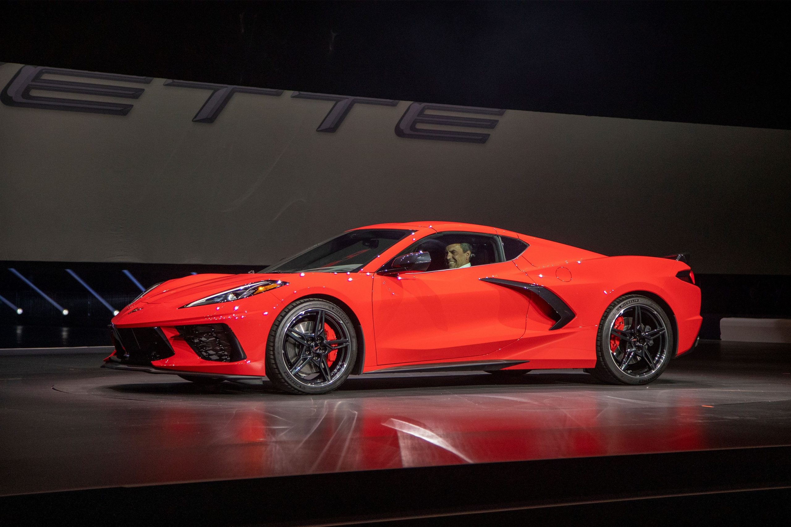 A red Chevrolet Corvette at its debut, shot in profile