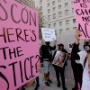 Around 40 family and friends of Monique Munoz attend a rally to call for justice in her death in front of L.A. District Attorney George Gascons office at the Hall of Justice in downtown Los Angeles on March 19, 2021. Munoz, 32, was killed in a car accident where a 17-year-old was driving 120 mph before crashing into her car. Munoz was driving home on Olympic Boulevard and Overland Avenue in Los Angeles when she was hit and killed. The boy, who is the son of Beverly Hills millionaire James Khuri, was booked on vehicular manslaughter in a Lamborghini crash Feb. 23 according to the Los Angeles Police Department but he was not charged.