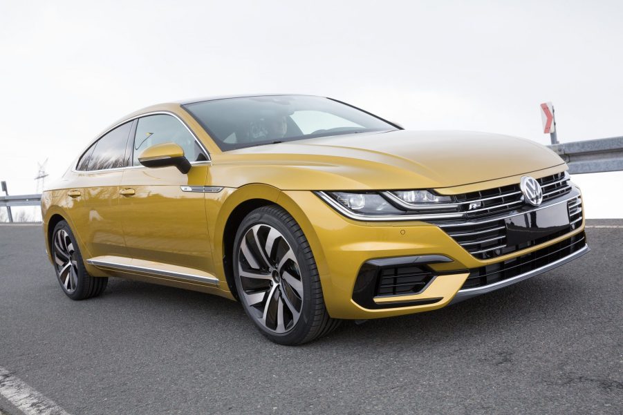 A yellow Volkswagen Arteon R shot from an angle