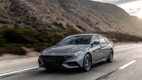 2021 Hyundai Elantra N Line driving down a canyon road