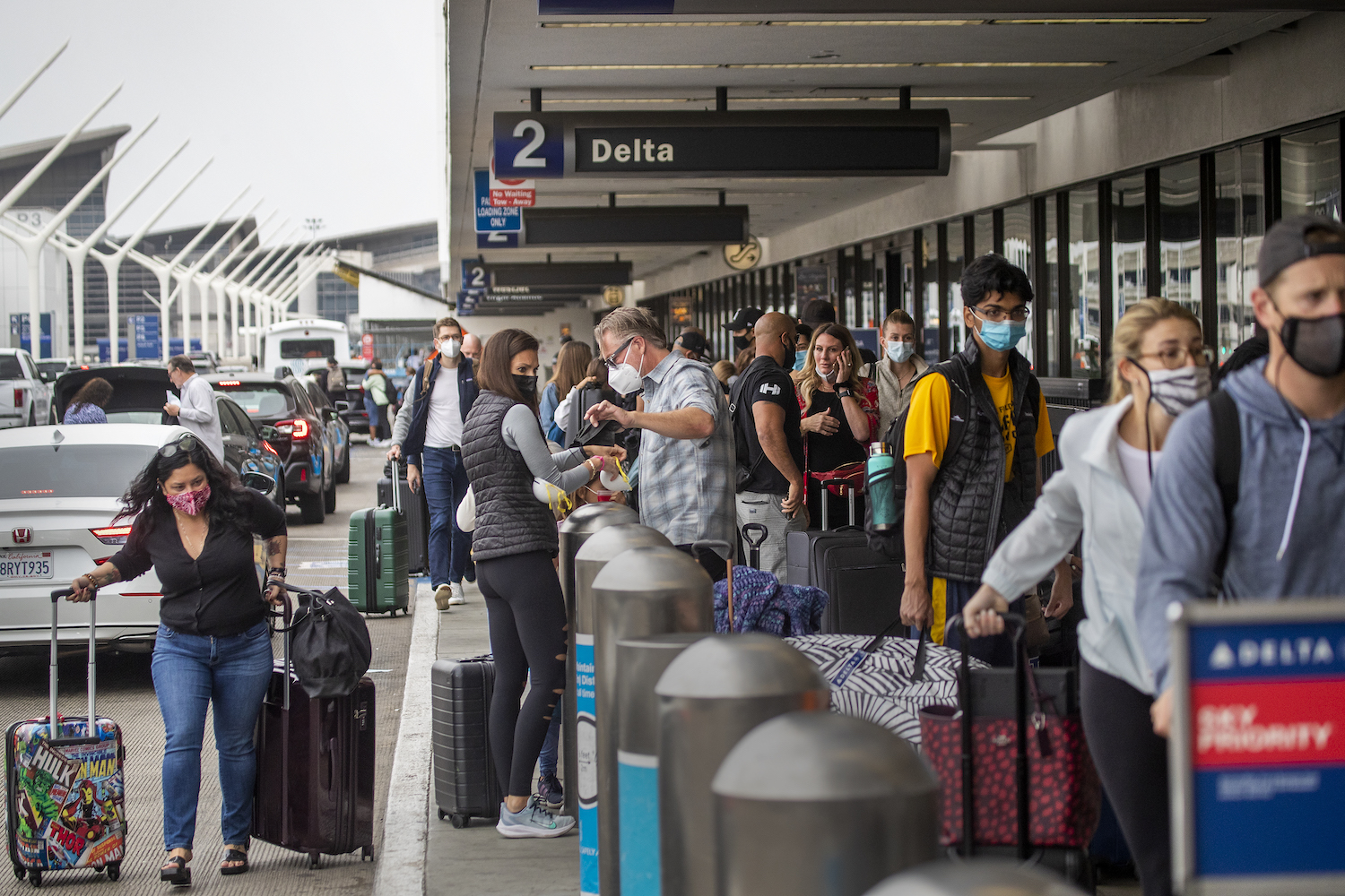 High numbers of travelers are making thanksgiving travel expensive this weekend. | Allen J. Schaben / Los Angeles Times via Getty Images