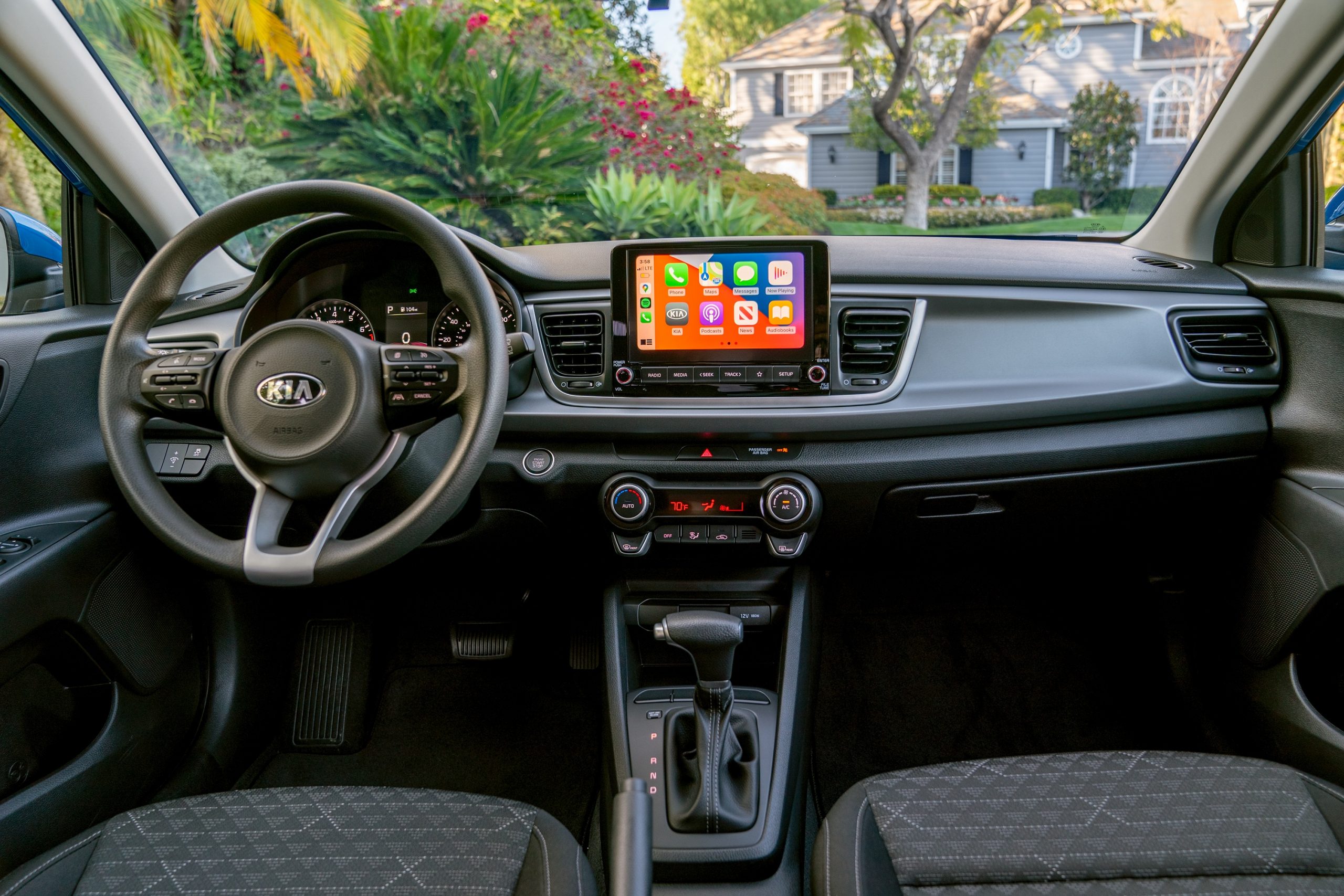 The interior of the 2022 Kia Rio shot from the rear seats