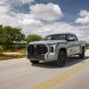 Promo photo of a Toyota Tundra SR5 2022 driving. This model offers low Toyota Tundra prices. | Toyota