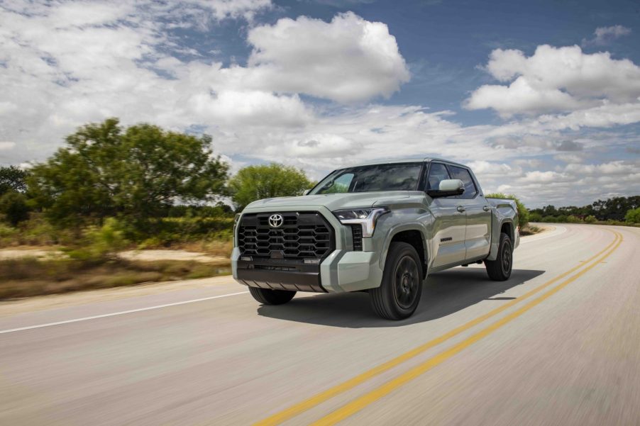 Promo photo of a Toyota Tundra SR5 2022 driving. This model offers low Toyota Tundra prices. | Toyota