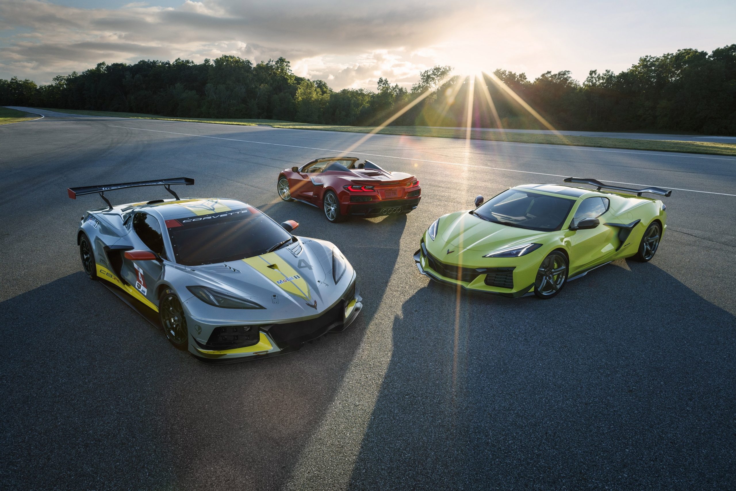 A trio of Chevrolet Corvette models shot at sunset