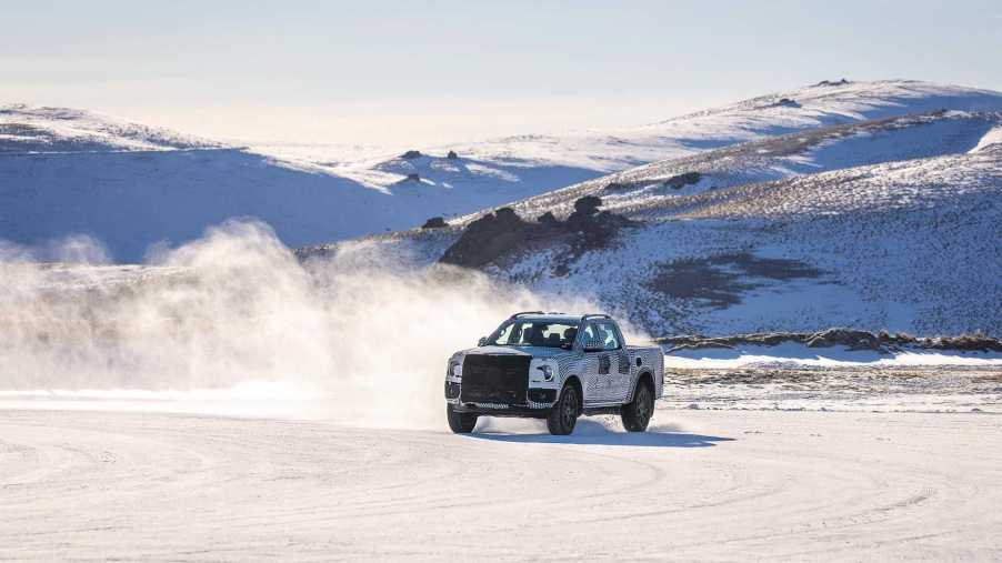 A camouflaged 2023 Ford Ranger drives through the snow in a teaser video from Ford, it'll debut November 24th