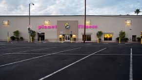 This is a picture of a 24-hour gym parking lot, not a legal place to park overnight. | Frederic J. Brown/AFP via Getty Images