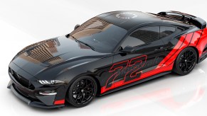 This is a computer render of M2 Motoring's Mustang GT race car build. The Ford Mustang sports car won car of the year at SEMA 2021. | Ford