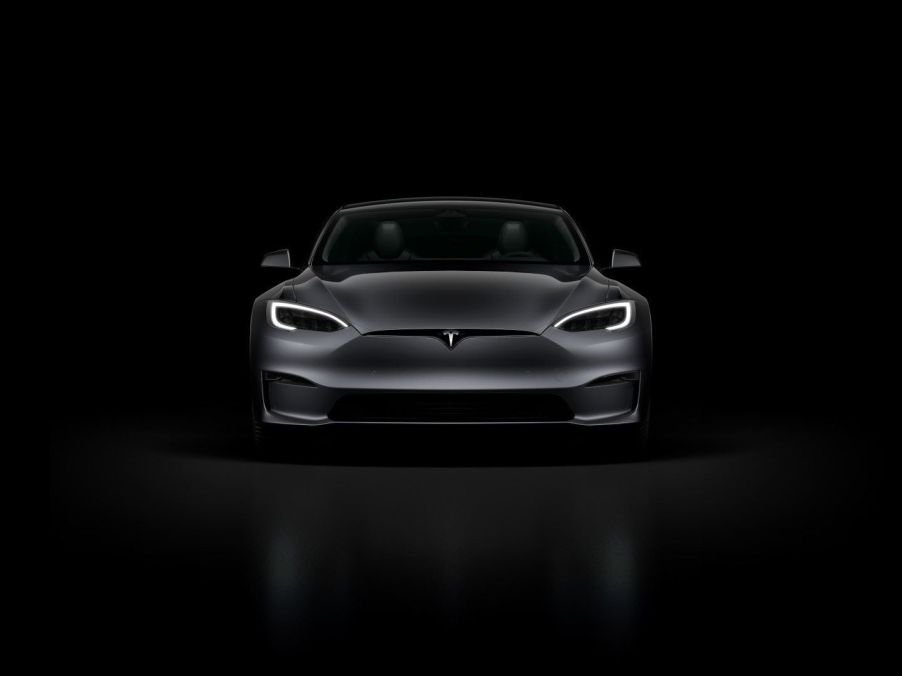 Front view of black Tesla Model S and Tesla Sentry Mode with Darth Vader voice feature