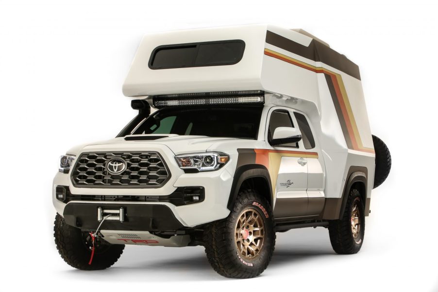 This is a promotional photo of Toyota's in-house Tacozilla custom Tacoma. The truck has a full camper instead of a bed, inspired by old Chinook campers. The Toyota Tacoma took home the mid-size SEMA truck of the year award. | Toyota