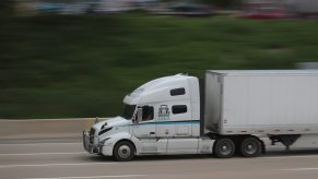 Semi-truck blasting down the highway