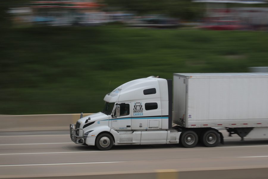 Semi-truck blasting down the highway