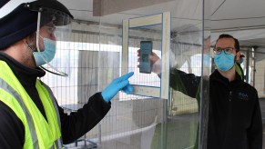 Autoworker employee going through a health screening at a Stellantis plant. Recently Stellantis set a vaccine mandate for all U.S. non-union employees