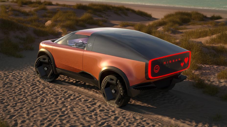 A side view of the futuristic-looking orange Nissan Surf-Out.