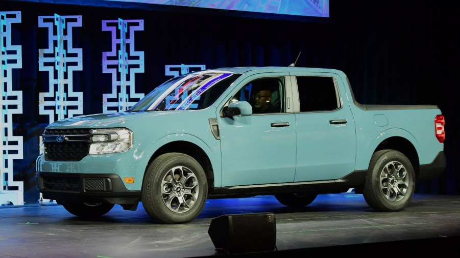 A blue 2022 Ford Maverick is on display.