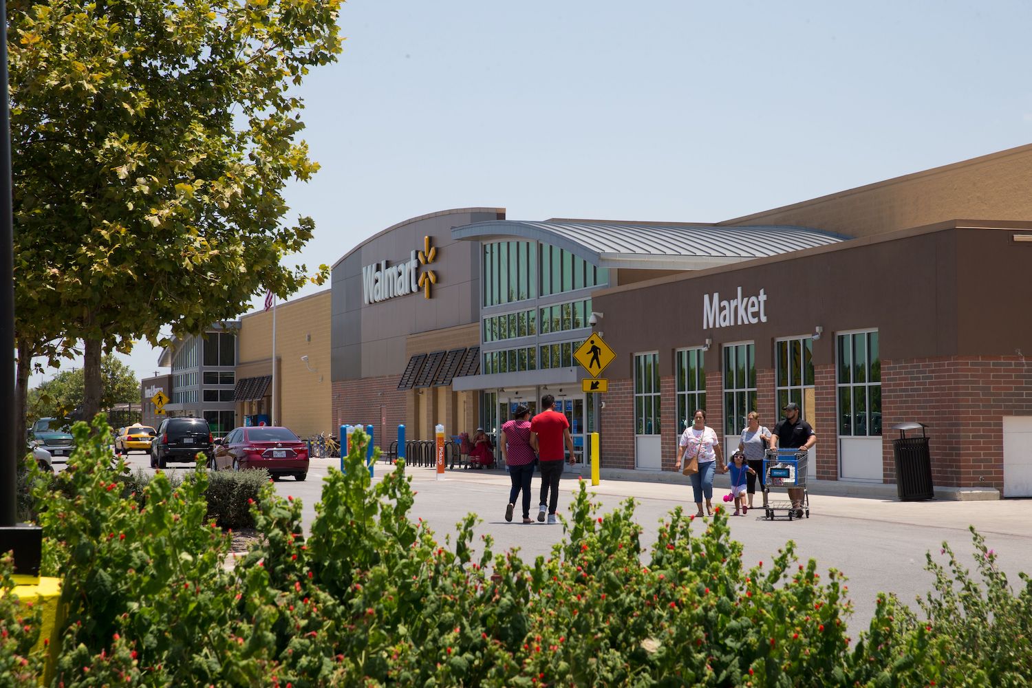 A photo of a Walmart parking. Many Walmarts allow overnight camping in cars and RVs | SUZANNE CORDEIRO/AFP via Getty Images